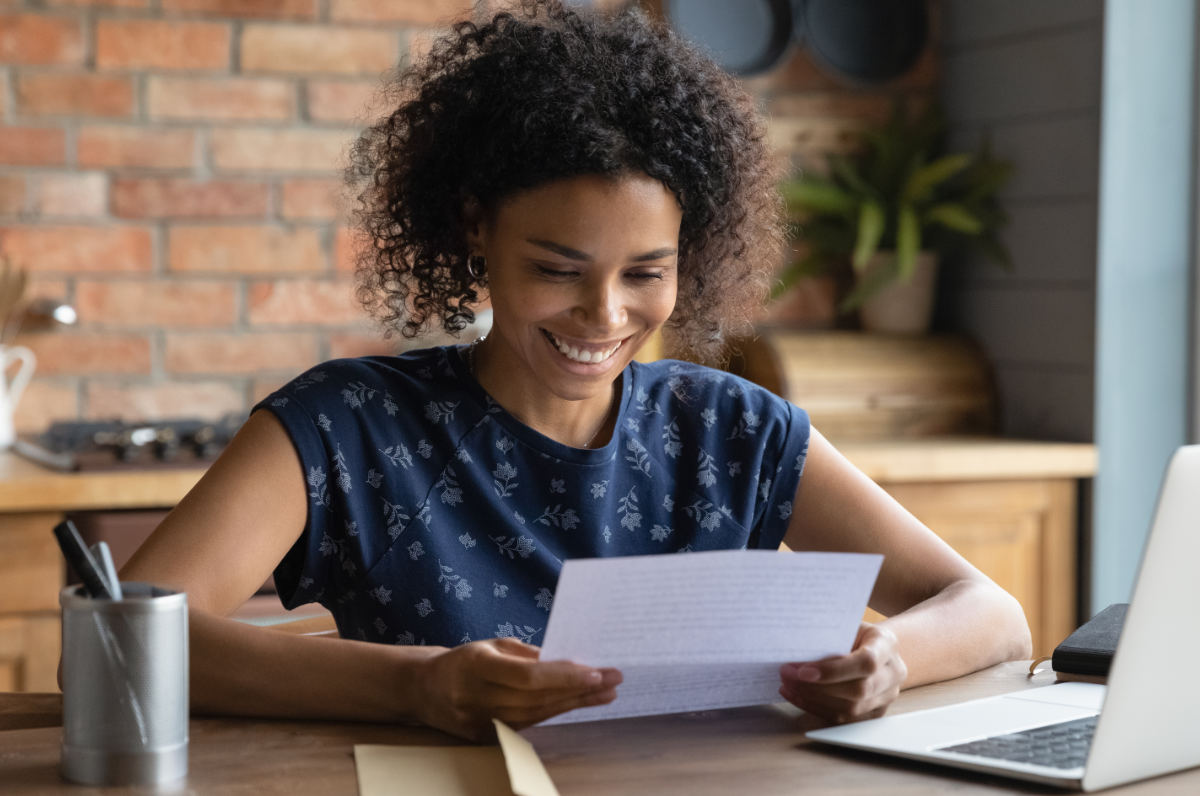 woman ready letter received through letter mailing service